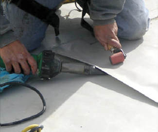 Hot Welding TPO Roof Seams with a Hand Held Welder Richmond Virginia Roofing